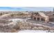 Attached garage and tennis court with mountain views at 1175 Ridge Oaks Dr, Castle Rock, CO 80104