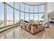 Living room with expansive windows and scenic views at 1175 Ridge Oaks Dr, Castle Rock, CO 80104