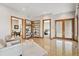 Bright office with built-in shelving and two comfortable armchairs at 1175 Ridge Oaks Dr, Castle Rock, CO 80104
