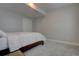 Neutral bedroom features carpeted floor, closet with sliding doors, and bright windows with blinds at 6172 N Liverpool St, Aurora, CO 80019