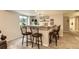 Basement bar area features a countertop, overhead lighting, and seating at 12164 Adams St, Thornton, CO 80241