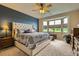Spacious main bedroom featuring a large bay window and ample natural light at 12164 Adams St, Thornton, CO 80241