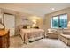Relaxing bedroom with natural light, a comfortable bed, and a peaceful ambiance at 12164 Adams St, Thornton, CO 80241