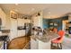 Beautiful kitchen with granite countertops, stainless steel appliances, and hardwood floors at 12164 Adams St, Thornton, CO 80241