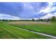 Expansive view of the open green space in this community at 12164 Adams St, Thornton, CO 80241
