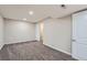 A finished basement featuring carpet and a nearby closet at 6914 E Briarwood Dr, Centennial, CO 80112