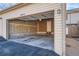Spacious two-car garage with ample room for vehicles and storage, featuring access to the home at 6914 E Briarwood Dr, Centennial, CO 80112
