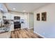 Well-equipped kitchen with stainless steel appliances and granite countertops at 6914 E Briarwood Dr, Centennial, CO 80112