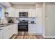 Kitchen with stainless steel appliances and granite countertops at 6914 E Briarwood Dr, Centennial, CO 80112