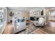 Inviting living room features a cozy fireplace and stylish décor at 6914 E Briarwood Dr, Centennial, CO 80112