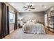 Basement bedroom with a desk and large bed at 1575 Ridgetrail Ct, Castle Rock, CO 80104