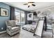 Unique bedroom featuring a bunk bed with a slide and a cozy chair at 1575 Ridgetrail Ct, Castle Rock, CO 80104