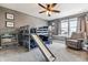 Charming bedroom featuring a playful bunk bed with slide and a cozy reading nook at 1575 Ridgetrail Ct, Castle Rock, CO 80104