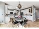 Elegant kitchen with white cabinets and an island at 1575 Ridgetrail Ct, Castle Rock, CO 80104