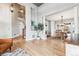 Spacious living room with hardwood floors, high ceilings, and a formal dining area at 1575 Ridgetrail Ct, Castle Rock, CO 80104