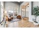 Open-concept living room featuring high ceilings, neutral colors, and lots of natural light at 1575 Ridgetrail Ct, Castle Rock, CO 80104