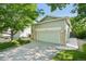Charming home featuring a two-car garage and manicured front yard at 10231 Spotted Owl Ave, Highlands Ranch, CO 80129