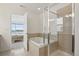 Bright bathroom with a tub and separate shower at 545 High Point Dr, Longmont, CO 80504