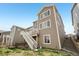 Rear exterior view showcasing the home's deck and well-maintained siding at 545 High Point Dr, Longmont, CO 80504