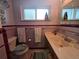 Charming bathroom with vintage tile, decorative accents, and a bright, welcoming atmosphere at 12375 W 19Th Pl, Lakewood, CO 80215