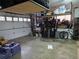 Spacious garage with storage and shelving, offering ample room for parking and organizing tools at 12375 W 19Th Pl, Lakewood, CO 80215