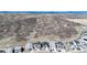 A wide aerial view of a new home development, featuring mountain views at 865 Oleander St, Castle Rock, CO 80109
