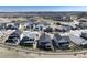An aerial view of houses showcasing the neighborhood layout and mountain views in the background at 865 Oleander St, Castle Rock, CO 80109