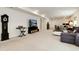 Finished basement featuring a TV, keyboard, sitting area, and dining table, perfect for entertaining or relaxing at 865 Oleander St, Castle Rock, CO 80109