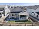 A backyard featuring artificial turf, a patio, a covered porch, and fencing at 865 Oleander St, Castle Rock, CO 80109