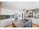Well-equipped kitchen featuring granite countertops, stainless steel appliances, and ample cabinet space at 9 Amaranth Dr, Littleton, CO 80127