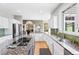 Modern kitchen with granite countertops, stainless steel appliances, and an open design perfect for entertaining at 9 Amaranth Dr, Littleton, CO 80127