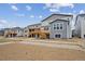 Home exteriors are featured in the backyard, highlighting new constructions and outdoor living spaces in a suburban community at 24768 E 40Th Ave, Aurora, CO 80019