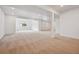 Spacious basement with neutral carpet, white walls and ceiling, and recessed lighting at 24768 E 40Th Ave, Aurora, CO 80019