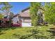 Inviting backyard featuring a deck, hot tub, and lush green lawn perfect for outdoor enjoyment at 4875 E 117Th Dr, Thornton, CO 80233