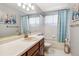 Bathroom featuring tile floors, white vanity and shower/tub combination at 4875 E 117Th Dr, Thornton, CO 80233