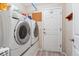 Bright laundry room equipped with a washer and dryer set at 4875 E 117Th Dr, Thornton, CO 80233