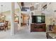 Large, open living room showcasing the staircase, entryway, and dining area at 4875 E 117Th Dr, Thornton, CO 80233