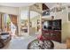 Spacious living room showcasing an open floor plan with a view to the dining area and a sliding glass door at 4875 E 117Th Dr, Thornton, CO 80233