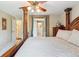 Comfortable main bedroom with ensuite bathroom access and dresser at 4875 E 117Th Dr, Thornton, CO 80233