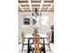 Traditional dining room featuring a coffered ceiling, classic chandelier, and bright natural light from large windows at 315 S Franklin St, Denver, CO 80209