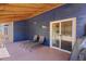 Relaxing back patio has a wooden deck and access to the house via sliding glass doors at 3238 W 11Th Avenue Pl, Broomfield, CO 80020