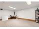 The carpeted bonus room in the basement area is perfect for gatherings or fun at 3238 W 11Th Avenue Pl, Broomfield, CO 80020