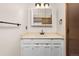 Well-kept bathroom featuring a vanity with a mirror and good lighting at 3238 W 11Th Avenue Pl, Broomfield, CO 80020