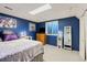 Finished basement bedroom with plush carpets, a closet, and an egress window at 3238 W 11Th Avenue Pl, Broomfield, CO 80020