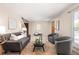 Comfortable living room featuring modern furnishings, neutral decor, and natural light, perfect for relaxation and entertaining at 3238 W 11Th Avenue Pl, Broomfield, CO 80020