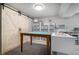 Functional craft room with large workspace, storage, and barn-style door at 21064 Woodside Ln, Parker, CO 80138