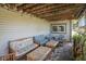 Covered patio with comfortable seating, perfect for outdoor relaxation and entertaining at 21064 Woodside Ln, Parker, CO 80138