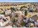 Aerial view of a home showcasing the mature landscaping and serene setting within a residential area at 7035 S Picadilly St, Aurora, CO 80016