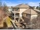 Charming home with a multi-tiered outdoor living space and beautiful landscaping is perfect for entertaining at 7035 S Picadilly St, Aurora, CO 80016