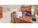 Beautiful home office with custom built-in desk, comfortable seating, and tranquil decor at 7035 S Picadilly St, Aurora, CO 80016